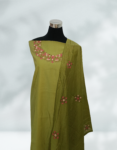 Tan Green Color Semi Silk Churidar Material With Beautiful Floral Embroidery & Small Sequence Work On Neck