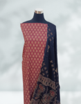 Women’s Ajrakh Print Cotton Blend Churidar Material Multi Color ( Pinkish Red Top With Floral Print, Black Color Printed Dupatta & Bottom )